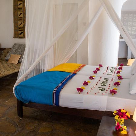 Kinondo Poa Hotel Diani Beach Esterno foto